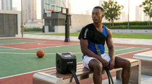 An athlete using the Cryon-X Pro cold compression unit on their knee for post-workout recovery.