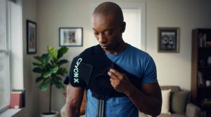 Man wearing shoulder wrap during the work injury process at home.